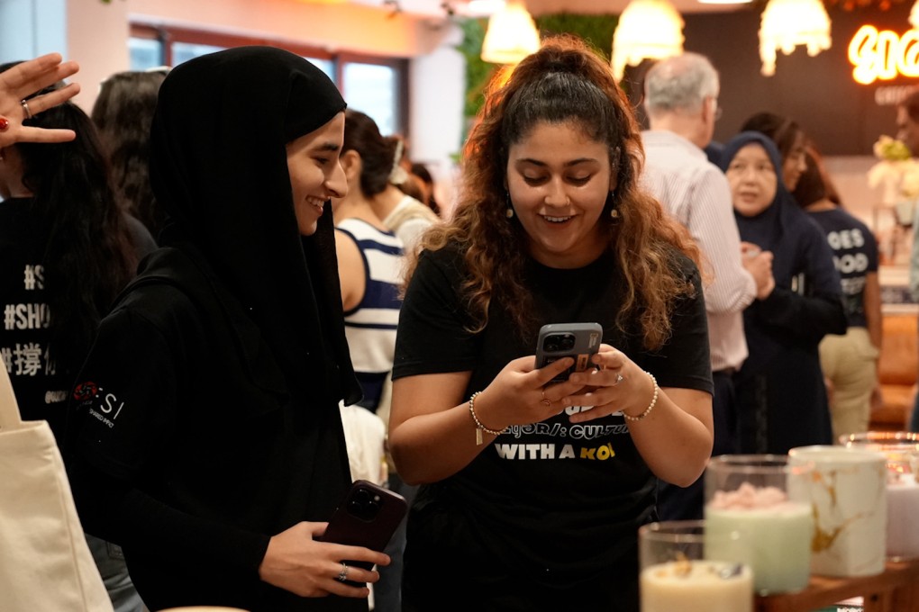 People interact at an event for small business owners from Hong Kong’s ethnic minority communities organised by the Foundation for Shared Impact in September. Photo: SCMP