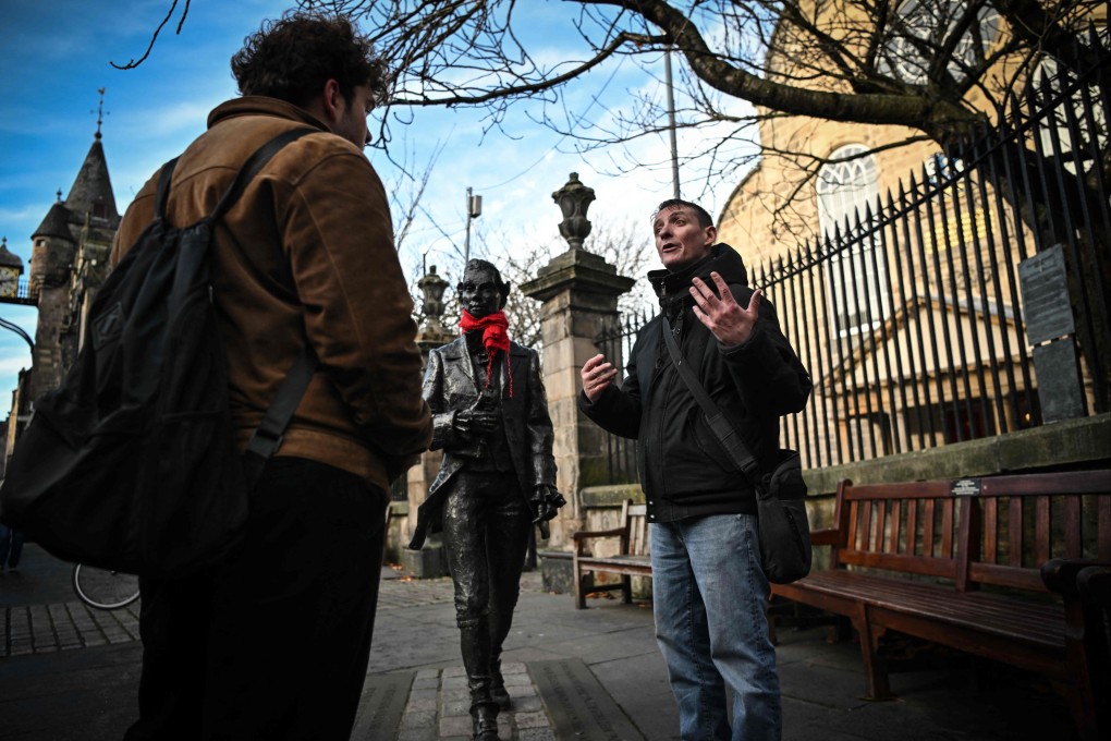 Invisible Cities tour guide Sonny Murray was once homeless and in and out of prison. Now he shows visitors Scotland’s capital from a different angle. Photo: AFP