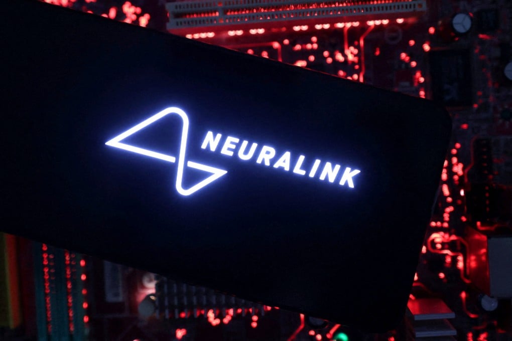 A smartphone with a Neuralink logo displayed is placed on a computer motherboard in this illustration taken May 15, 2024. Photo: Reuters