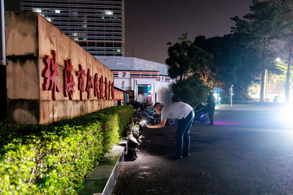 Residents places tributes to the dead outside the stadium in Zhuhai where 35 people were killed by an SUV. Photo: EPA-EFE