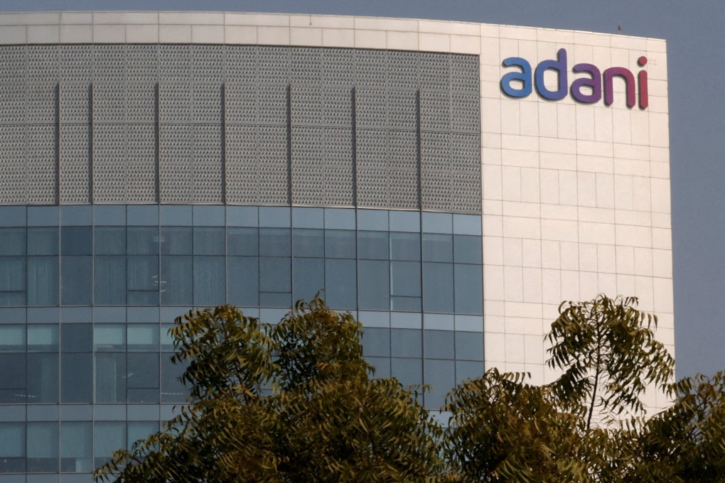 Logo of the Adani Group is seen on the facade of its Corporate House on the outskirts of Ahmedabad, India. Photo: Reuters
