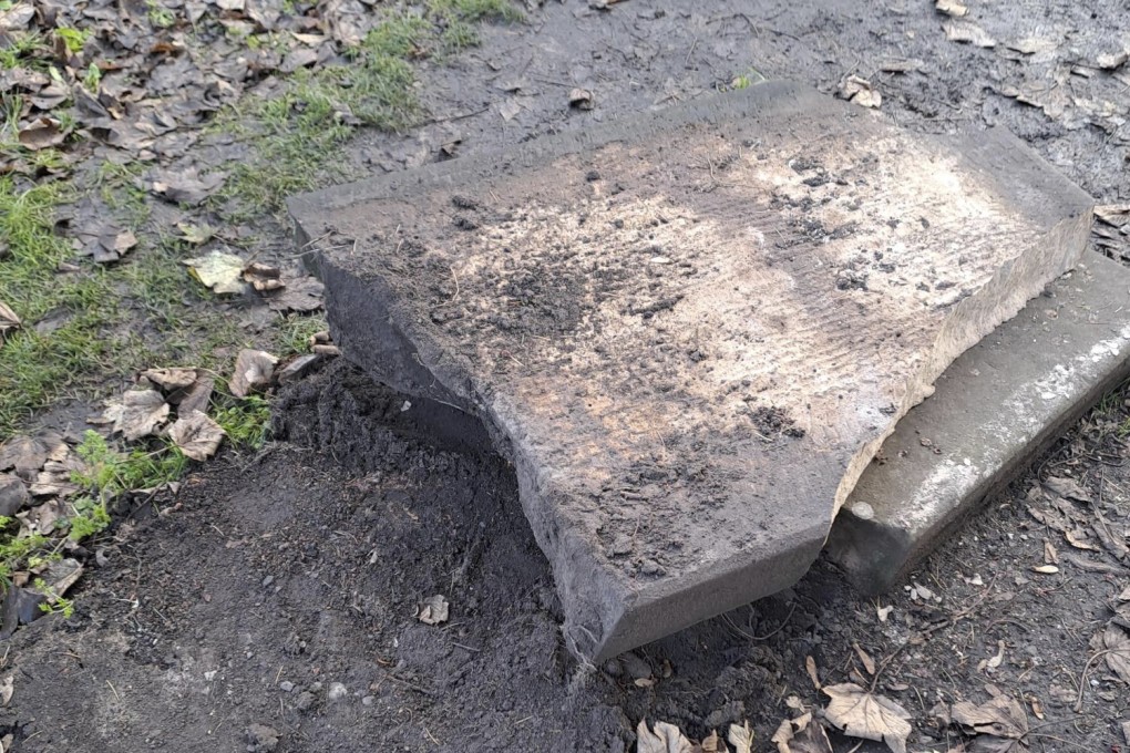 A smashed film set prop tombstone that was used for A Christmas Carol. Photo: West Mercia Police via AP