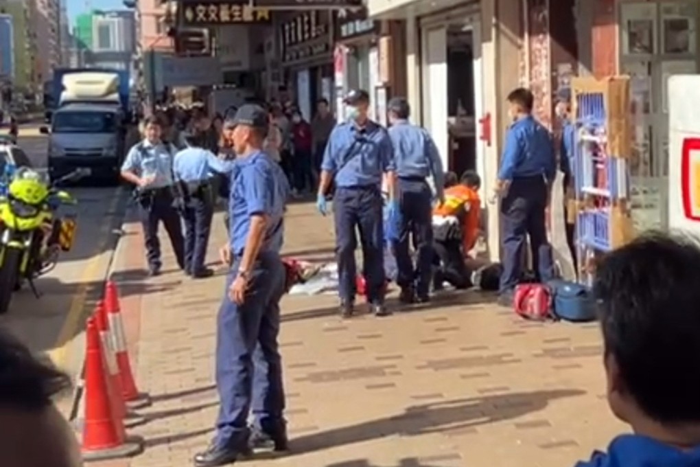 Emergency services personnel treat the man found on the roadside. Photo: Handout
