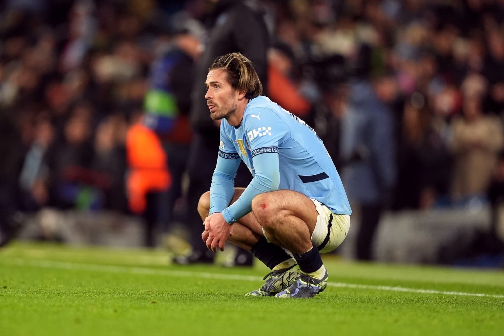 Manchester City’s Jack Grealish cut a dejected figure after the final whistle at the Etihad Stadium. Photo: DPA