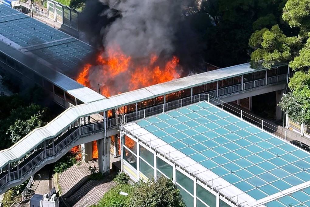 The fire started under a footbridge near the noise barrier. Photo: Handout