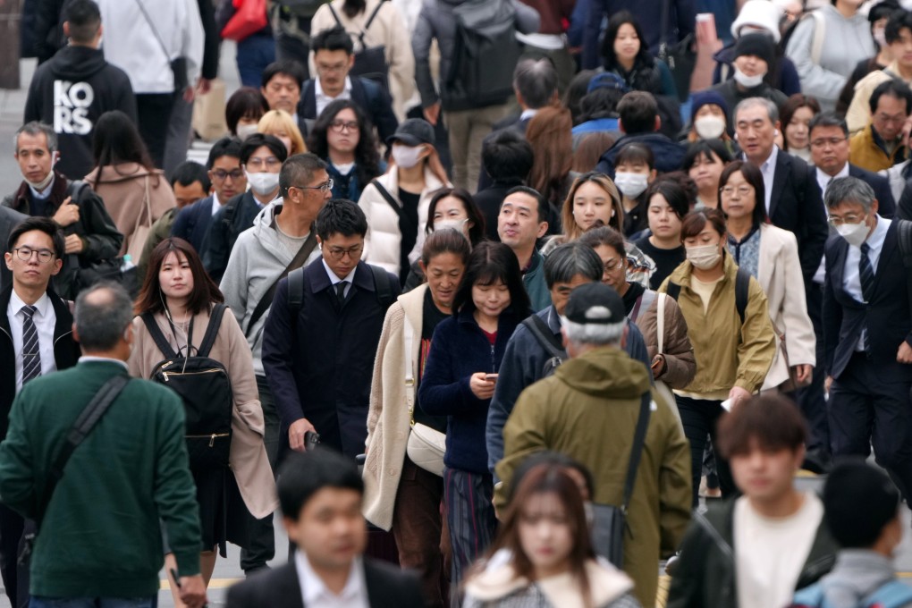Pedestrians walking down a Shinjuku street in Tokyo, Japan. Photo: EPA-EFE