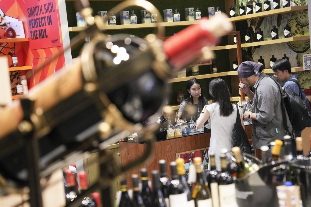 A wine tasting session at a booth of the Hong Kong International Wine and Spirits Fair in November. Photo: Elson Li
