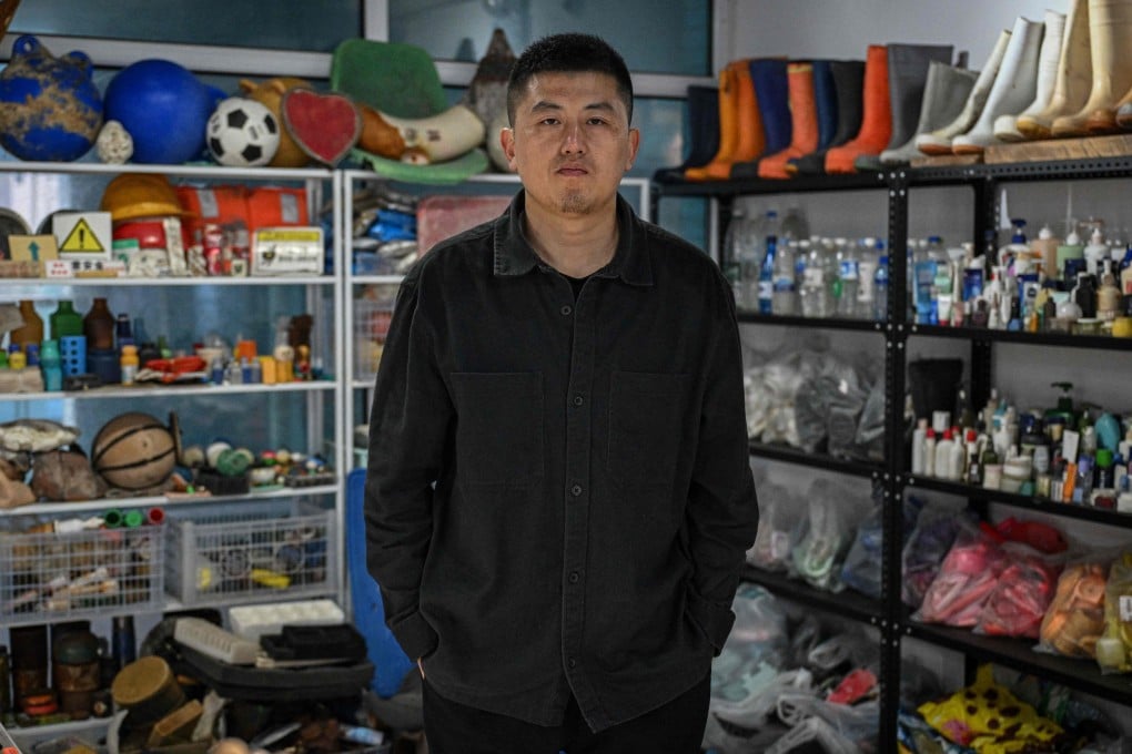 Artist Fu Junsheng at his studio in the Miaodao archipelago off Yantai, in eastern China’s Shandong province. Fu collects plastic that washes up on its beaches and turns it into work that highlights the issue of marine pollution. Photo: AFP