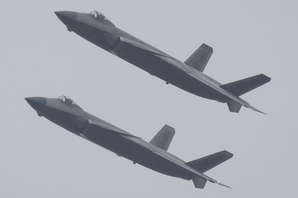 Chinese military researchers have pitted the Chinese J-20 stealth fighter - seen here during the recent China Airshow - against an American F-22 in a simulated battle to see who would be victorious. Photo: AFP