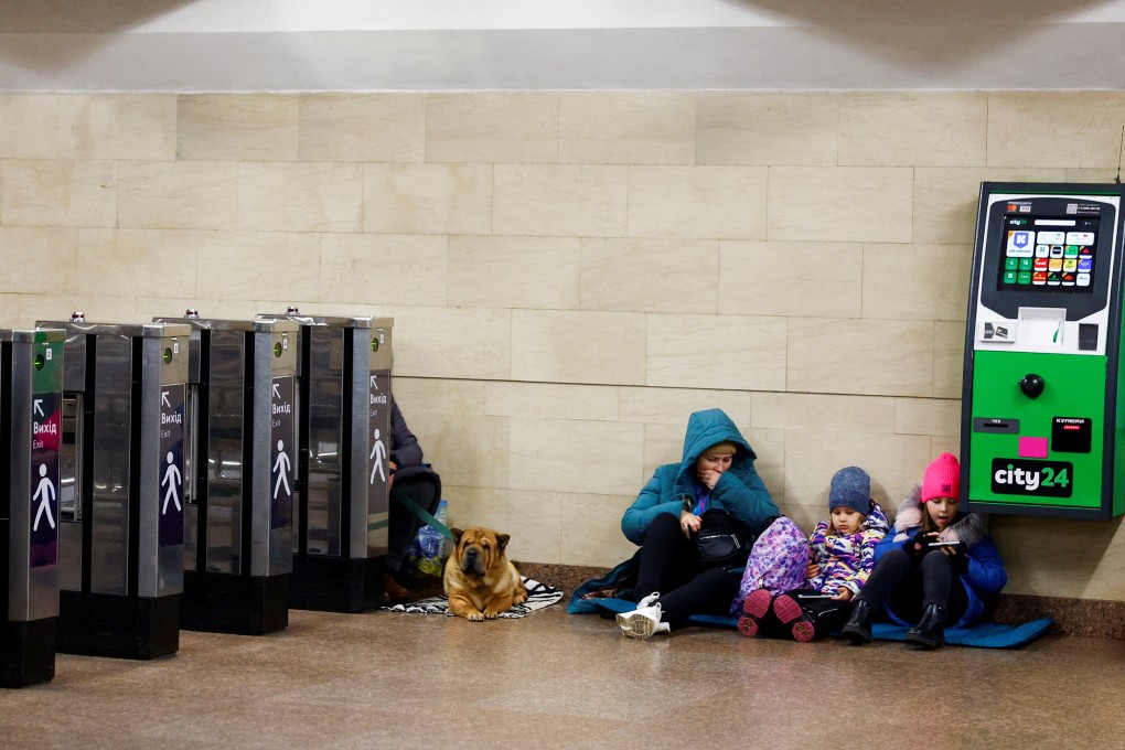 People take shelter inside a Kyiv metro station during a Russian attack. Photo: Reuters
