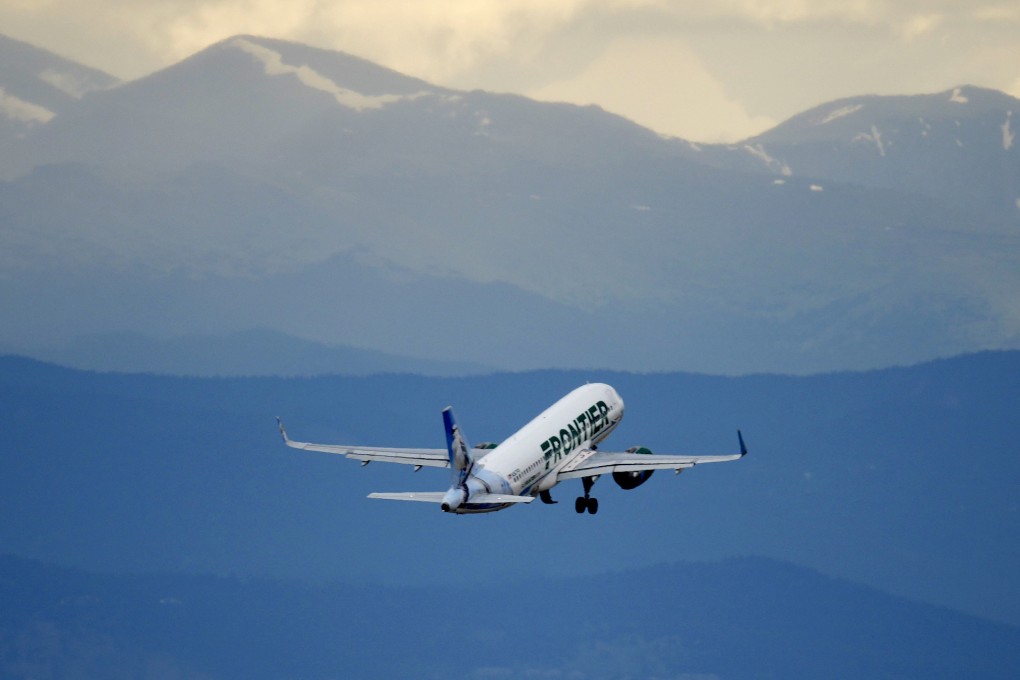 A Frontier Airlines jet takes off from Denver International Airpor. The 19 plaintiffs were among the 197 people on board Flight 1326 from San Diego to Las Vegas on October 5. Photo: AP