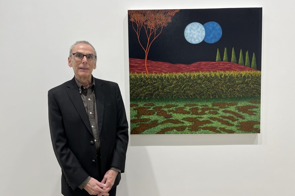 Scott Kahn with his 2023 painting Blue Moon at the opening of his exhibition “Once in a Blue Moon” at David Zwirner Hong Kong. At the age of 78, he has his first solo show in Asia. Photo: Enid Tsui