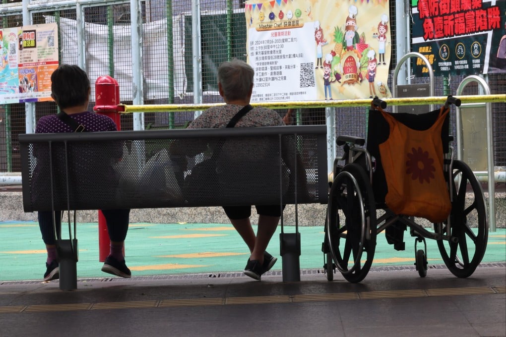 Two elderly women rest in a park next to a wheelchair, in Hong Kong’s Cheung Sha Wan district on May 29. Photo: Jelly Tse
