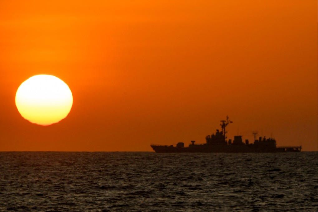 A Chinese navy ship sailing during the sunrise near the Scarborough Shoal. Bill Overholt, who died recently aged 79, believed that fears and myths must be rejected, calling for the creation of a “coalition of hope”. Photo: AFP