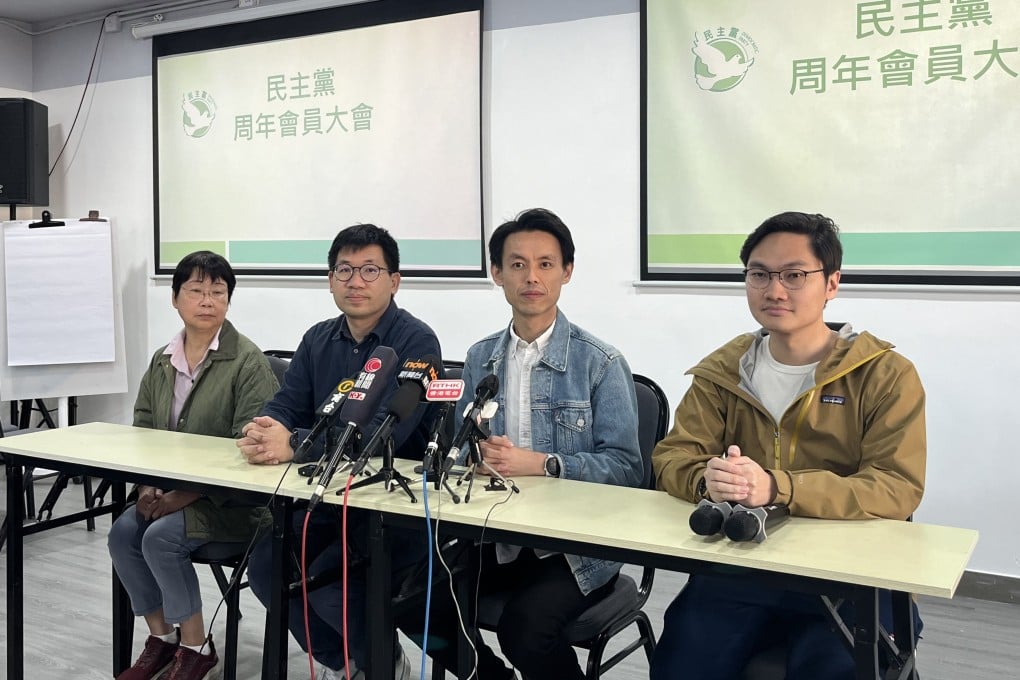 Lo Kin-hei (second from right) meets the press after his re-election. Photo: Emily Hung
