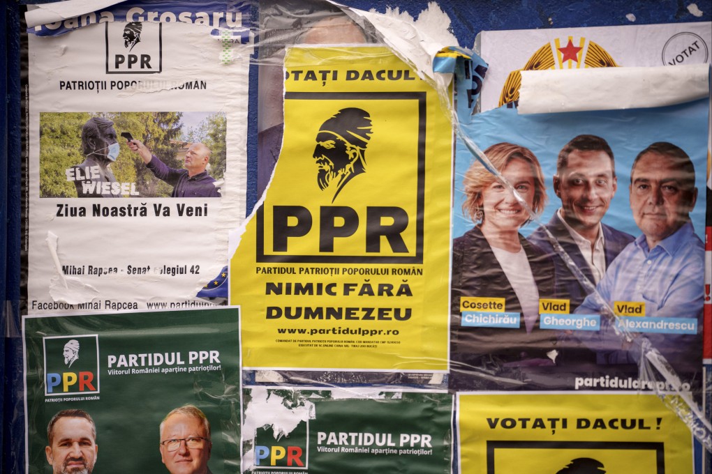 Posters ahead of the country’s December 1 parliamentary elections. Photo: AP
