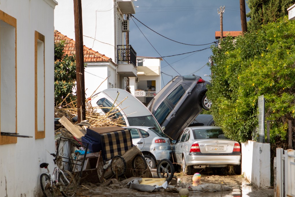 Cars piled up on a road full of mud following the passage of Storm Bora in Rhodes, Greece, on Sunday.  Photo: EPA-EFE