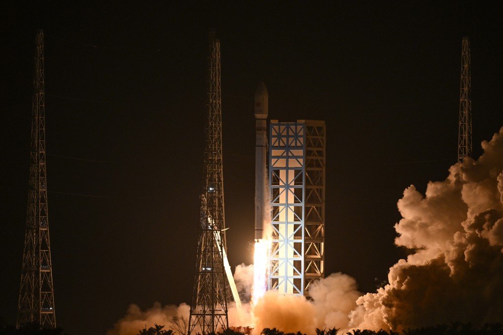 A Long March-12 rocket carrying two experimental satellites blasts off from the Hainan launch site on Saturday. Photo: Xinhua