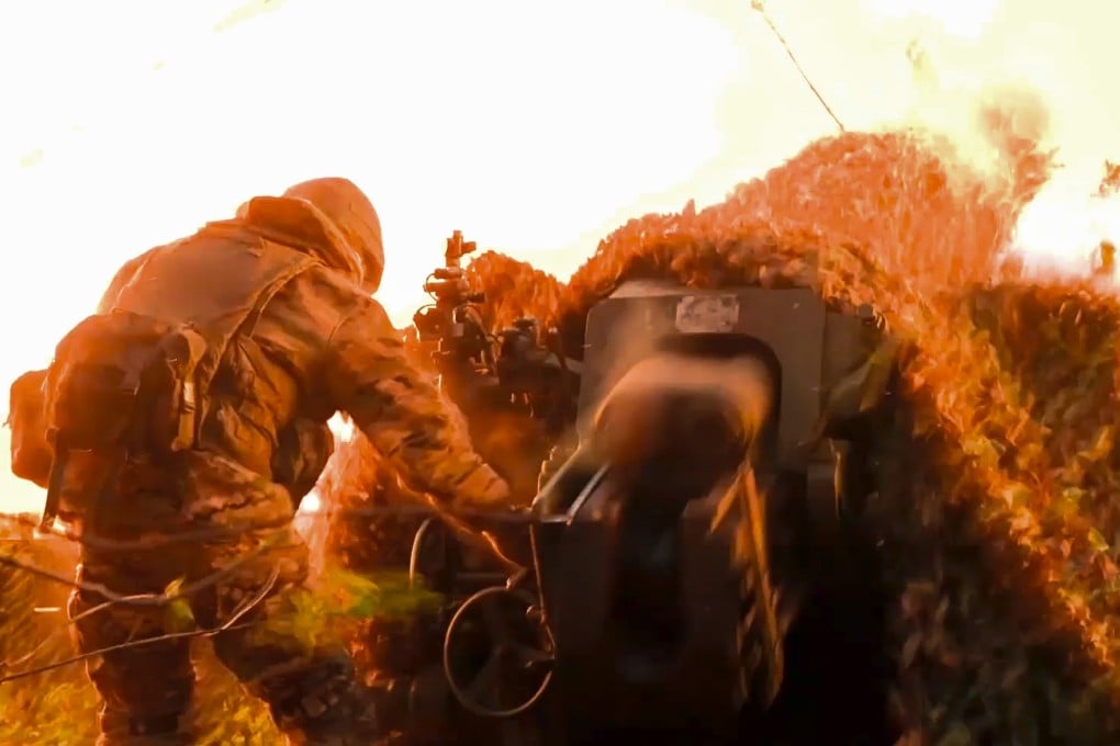 A Russian serviceman fires a D-30 howitzer towards Ukrainian positions in the border area of Kursk region, Russia. Photo: Russian Defence Ministry via AP