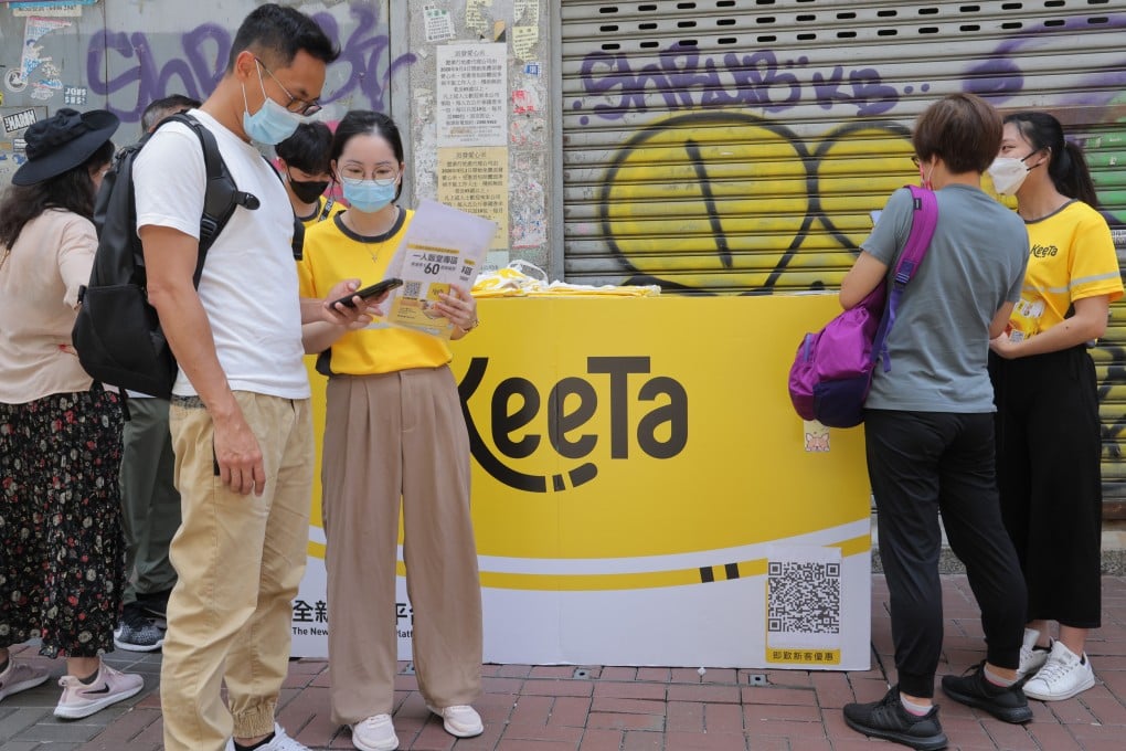 Keeta employees promote the food delivery service to customers in Hong Kong. Photo: Jelly Tse
