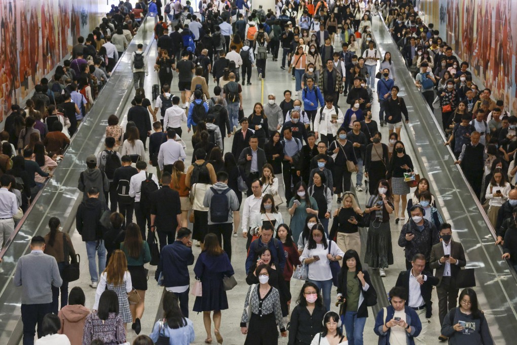 Commuters on the move in Central MTR station in Hong Kong’s business district. Photo: May Tse