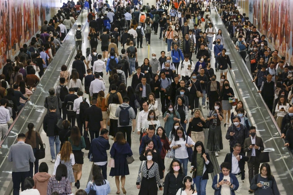 Commuters on the move in Central MTR station in Hong Kong’s business district. Photo: May Tse