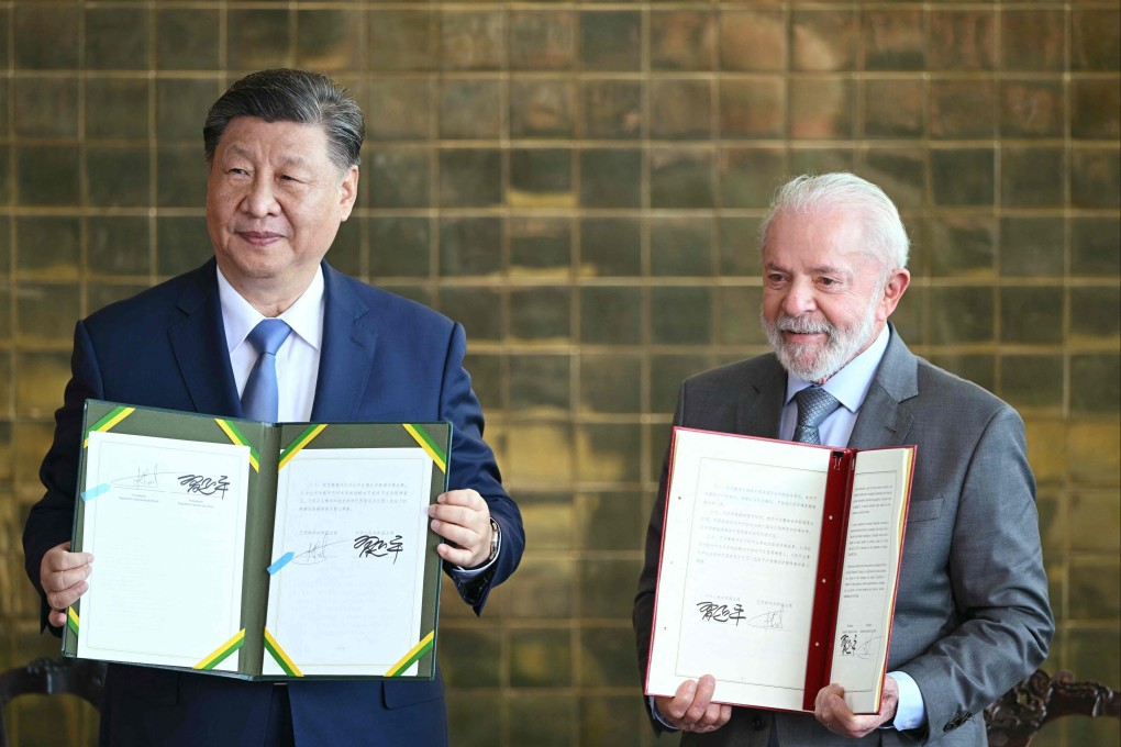 China’s President Xi Jinping and Brazil’s President Luiz Inacio Lula da Silva show bilateral agreements after a meeting at the Planalto Palace in Brasilia. Photo: AFP