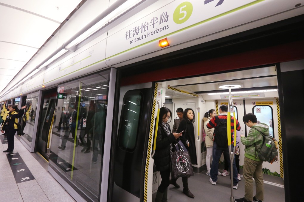 Passengers board a South Island line train at Admiralty station. Photo: 
 Dickson Lee