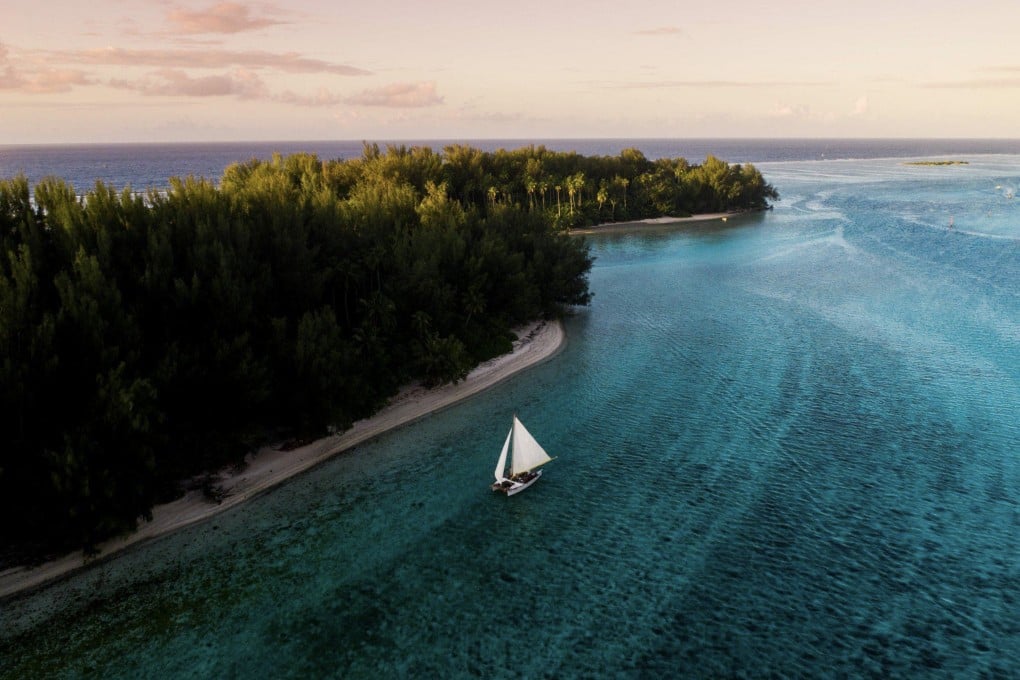 A resurrected Polynesian canoe called the Vaapiti sails in Tahiti. Boating classes and trips are teaching visitors about seafaring culture and keeping traditions alive. Photo: Vaapiti