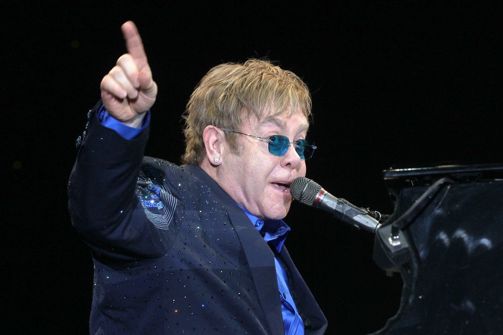Elton John gestures during his concert at the Hong Kong Convention and Exhibition Centre in 2012. The singer told a London theatre audience he has lost his sight. Photo: K.Y. Cheng