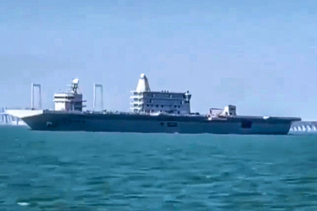 The new vessel shares similarities with the Chinese navy’s Type 075 landing helicopter dock, but it features three protruding structures on the flight deck, rather than two.  Photo: X/ @sugar_wsnbn