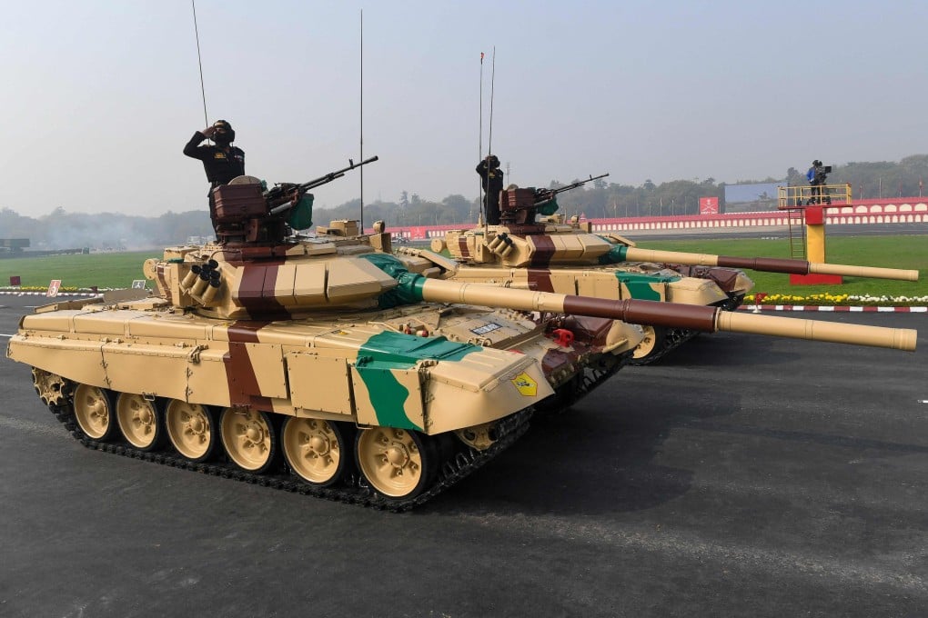 Soldiers in Russian-made T-90 tanks march past during a ceremony to celebrate India’s 73rd Army Day in New Delhi in January 2021. Photo: AFP