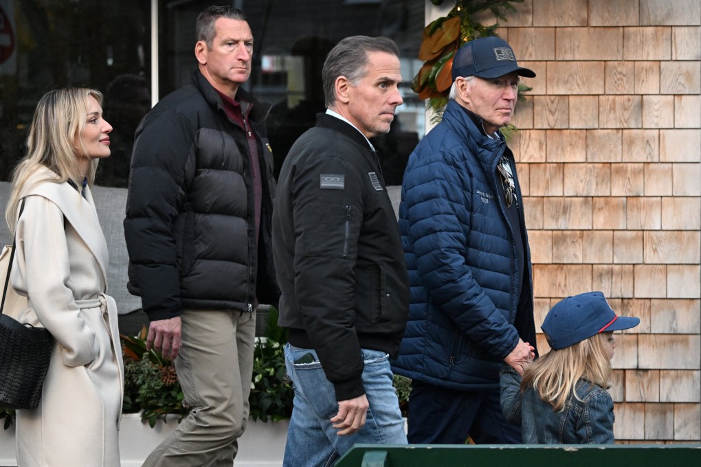 US President Joe Biden walks in downtown Nantucket, Massachusetts, on November 29 with his son Hunter, grandson Beau Jnr and daughter-in-law Melissa Cohen Biden. Photo: Reuters