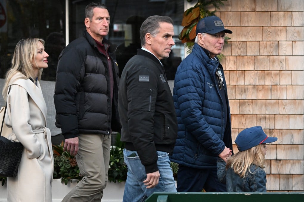 US President Joe Biden walks in downtown Nantucket, Massachusetts, on November 29 with his son Hunter, grandson Beau Jnr and daughter-in-law Melissa Cohen Biden. Photo: Reuters