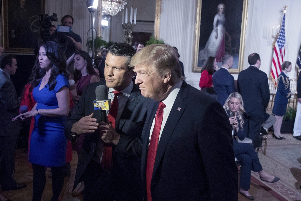 Donald Trump with “Fox & Friends” co-host Pete Hegseth in 2017. Photo: AP
