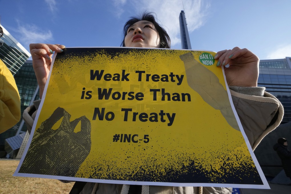 A South Korean activist calls for a strong global plastics treaty outside the venue for the meeting of the Intergovernmental Negotiating Committee on Plastic Pollution in Busan, South Korea, on December 1. Photo: AP