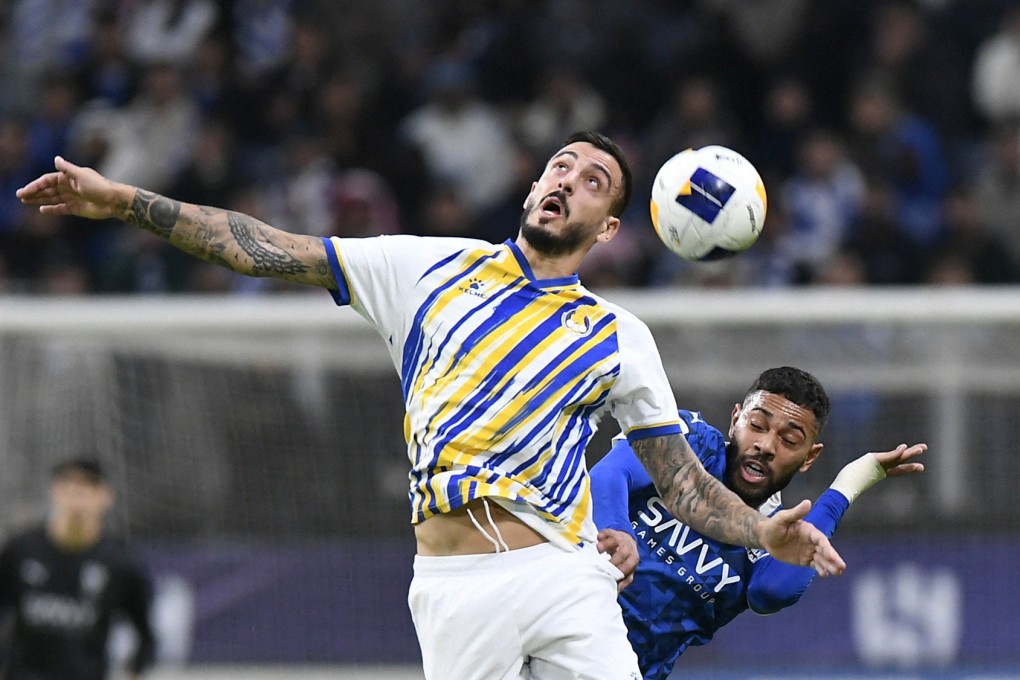 Al Gharafa’s Joselu (left) in a tussle with Al-Hilal’s Renan Lodi, whose team won 3-0 to go to the top of the western zone of the Asian Champions League Elite. Photo: Reuters