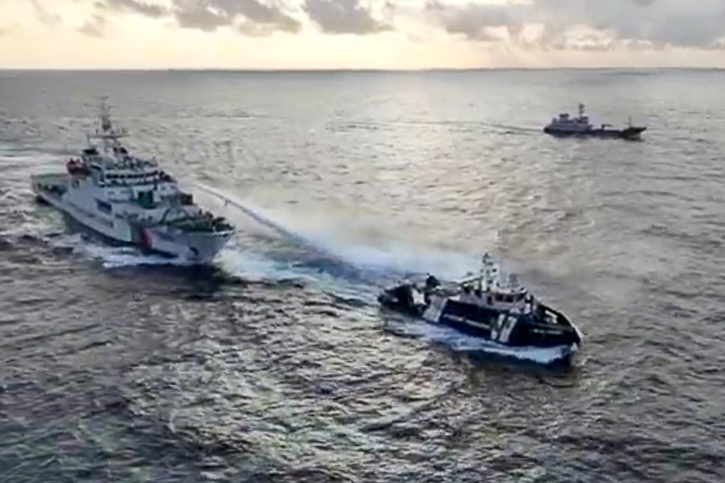 A Chinese coastguard ship blocks Philippine vessels near the Scarborough Shoal on Wednesday. Four coastguard vessels from the Philippines were prevented from entering territorial waters, China says. Photo: Philippine Coast Guard