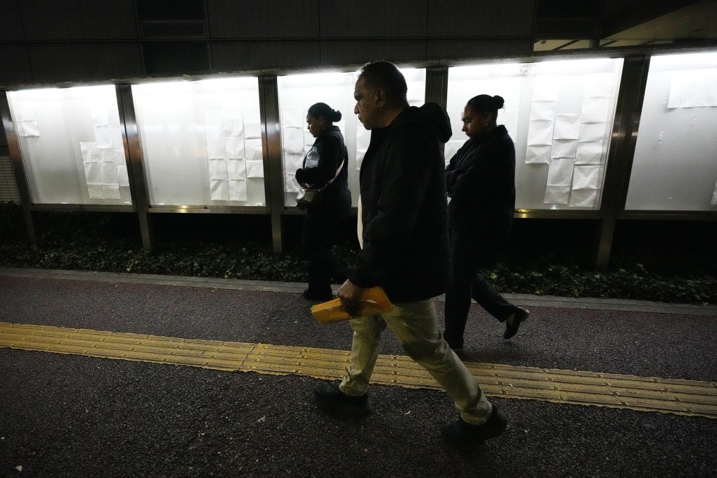 Family members of Australian citizen Donna Nelson walk out from the Chiba District Court after the opening day of the trial over Nelson for attempting to import drugs into Japan. Photo: AP