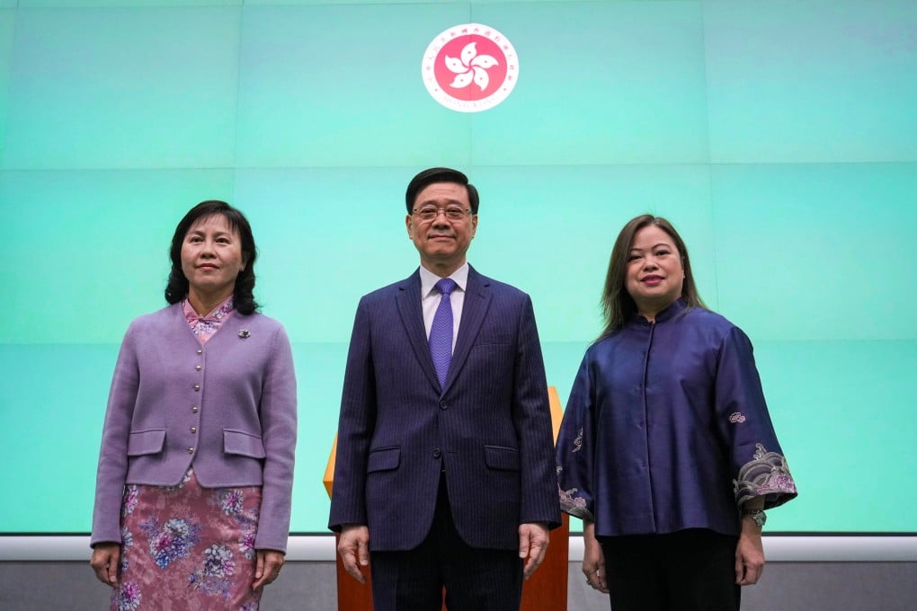Newly appointed Hong Kong transport minister Mable Chan (left) with Chief Executive John Lee Ka-chiu and new tourism secretary Rosanna Law on Thursday. Photo: May Tse