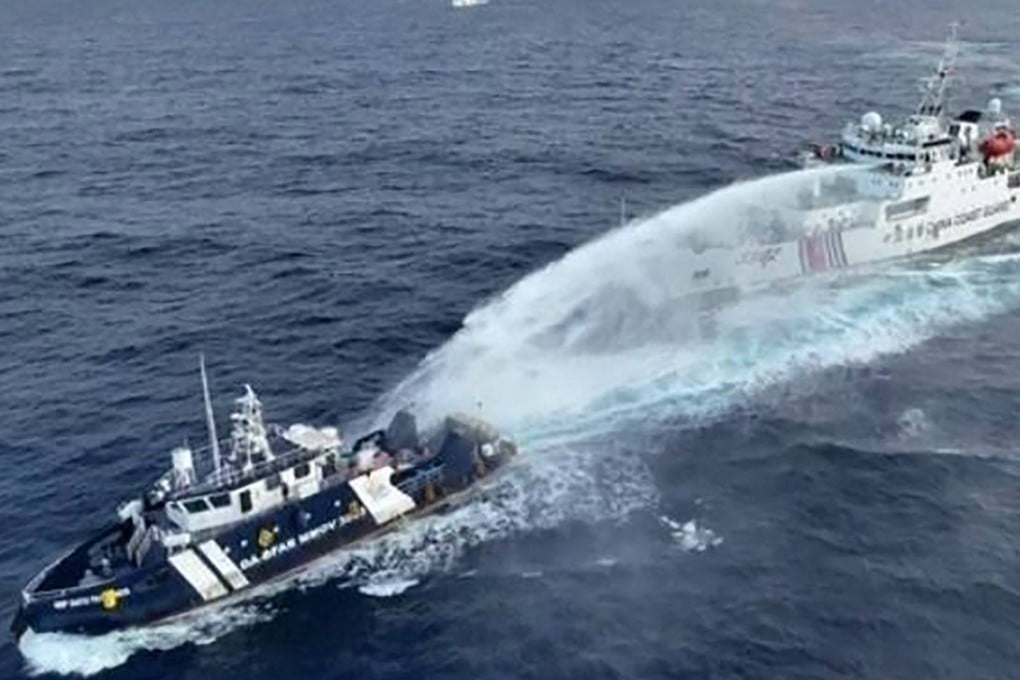 A China Coast Guard ship (right) deploys water cannon at a Phillipine Bureau of Fisheries and Aquatic Resources vessel BRP. Photo: National Task Force for the West Philippine Sea/AFP