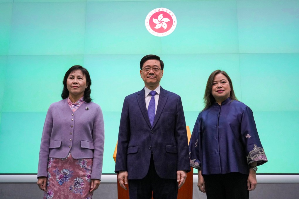 Mable Chan (left), Chief Executive John Lee (centre) and Rosanna Law. Photo: May Tse