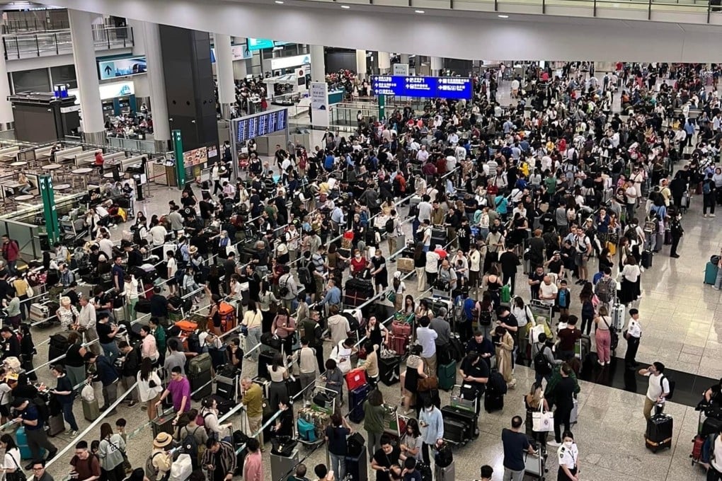 Passengers are stranded at Hong Kong International Airport amid a No 9 typhoon warning signal in October. Photo: Handout