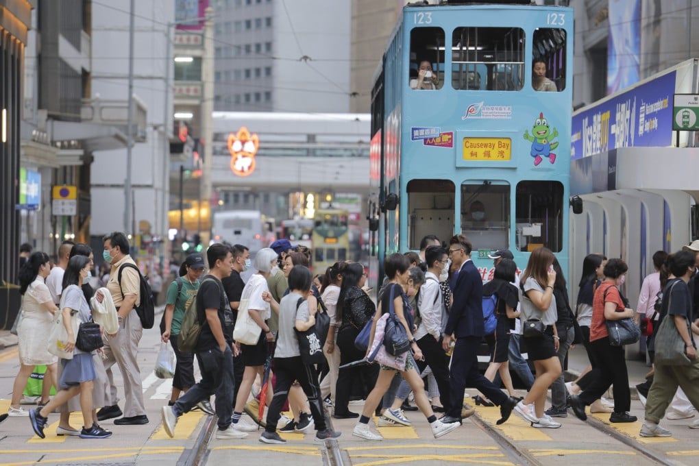 People cross a road in Central on August 17, 2023. Photo: Jelly Tse