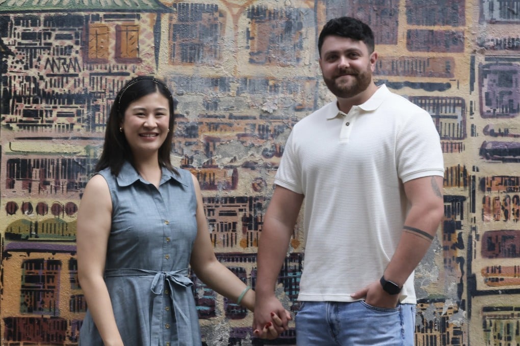 Daniel and Ellen Peacock, content creators on Cantonese and Hong Kong culture, in Central on a recent visit to the city where they met and married. His mastery of Cantonese has gained the family a following on social media. Photo: Jonathan Wong