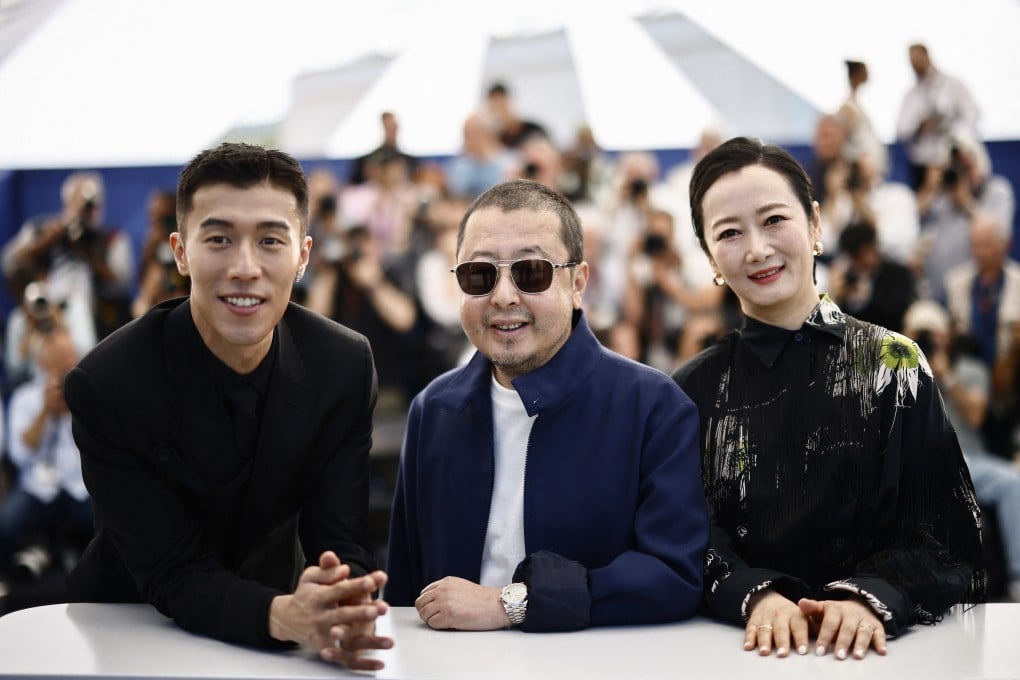 Chinese auteur Jia Zhangke and cast members of his latest film Caught by the Tides, Zhao Tao and Zhou You at the 77th Cannes Film Festival in Cannes, France, on May 19. Photo: Reuters