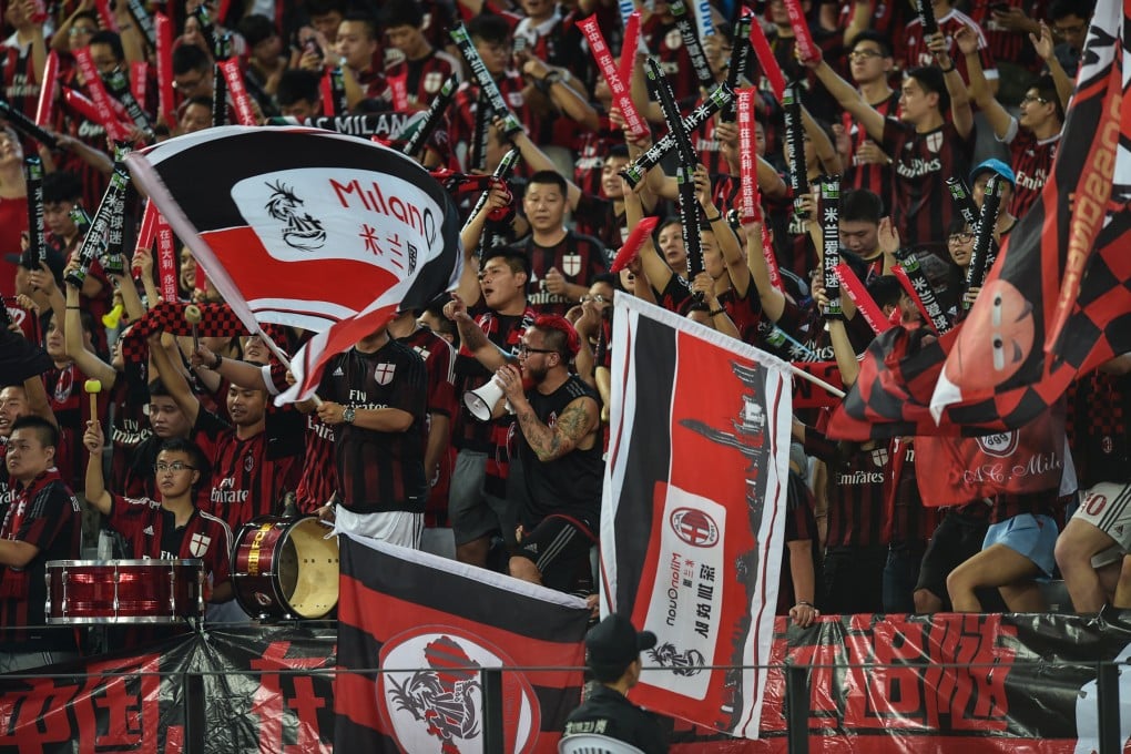 AC Milan fans cheer on their team during a International Champions Cup clash with Inter Milan in Shenzhen. Photo: Xinhua
