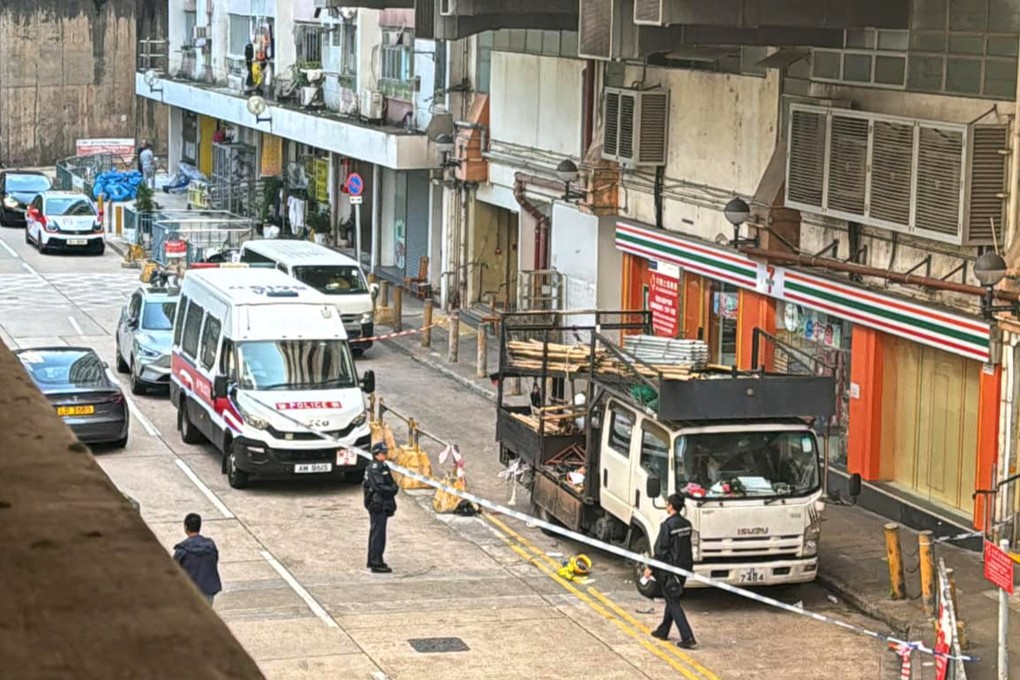 The victim landed on a truck loaded with bamboo poles after falling, police say. Photo: Facebook/Chris Wong