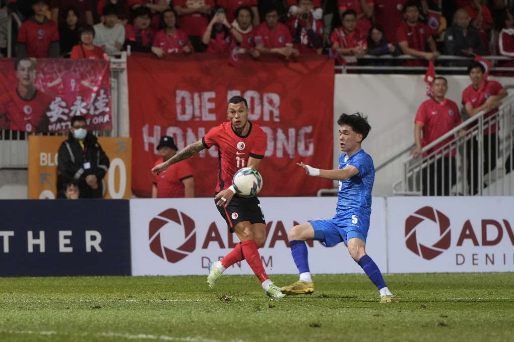 Hong Kong’s Everton Camargo (left) fires a shot towards goal as Mongolia’s Munkhsaikhan Munkhkhuslen closes in at Mong Kok Stadium. Photo: Sam Tsang
