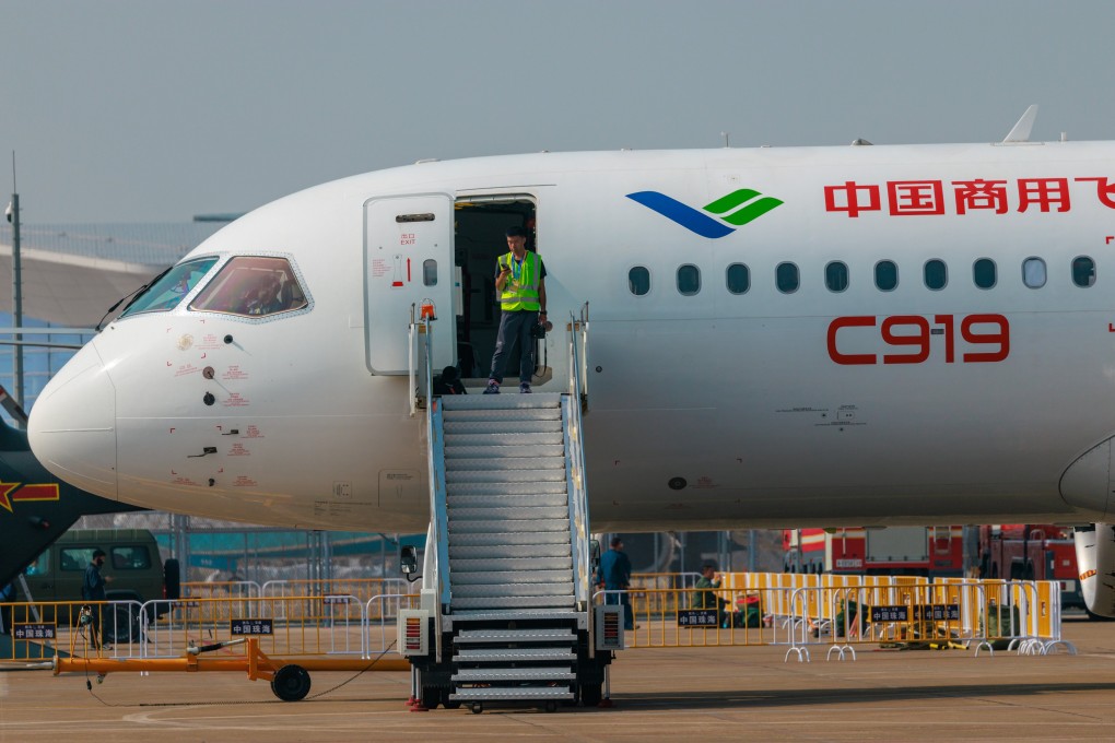 A C919 passenger airplane stands on display at the Zhuhai air show. Photo: EPA-EFE